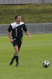 John Beltran playing soccer for the Autodesk team.